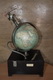 Model of the gyro compass with globe built-in elevator mechanism